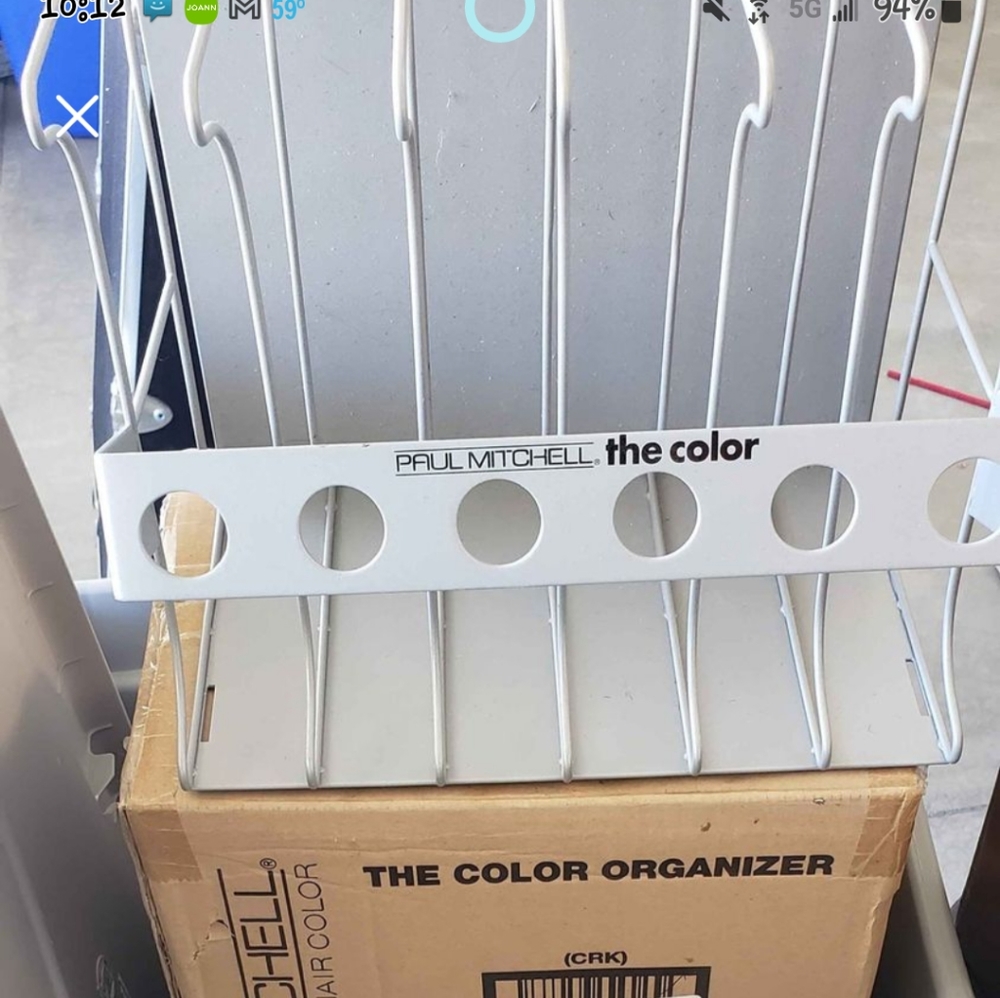 Paul Mitchell color tube storage wall racks. X7